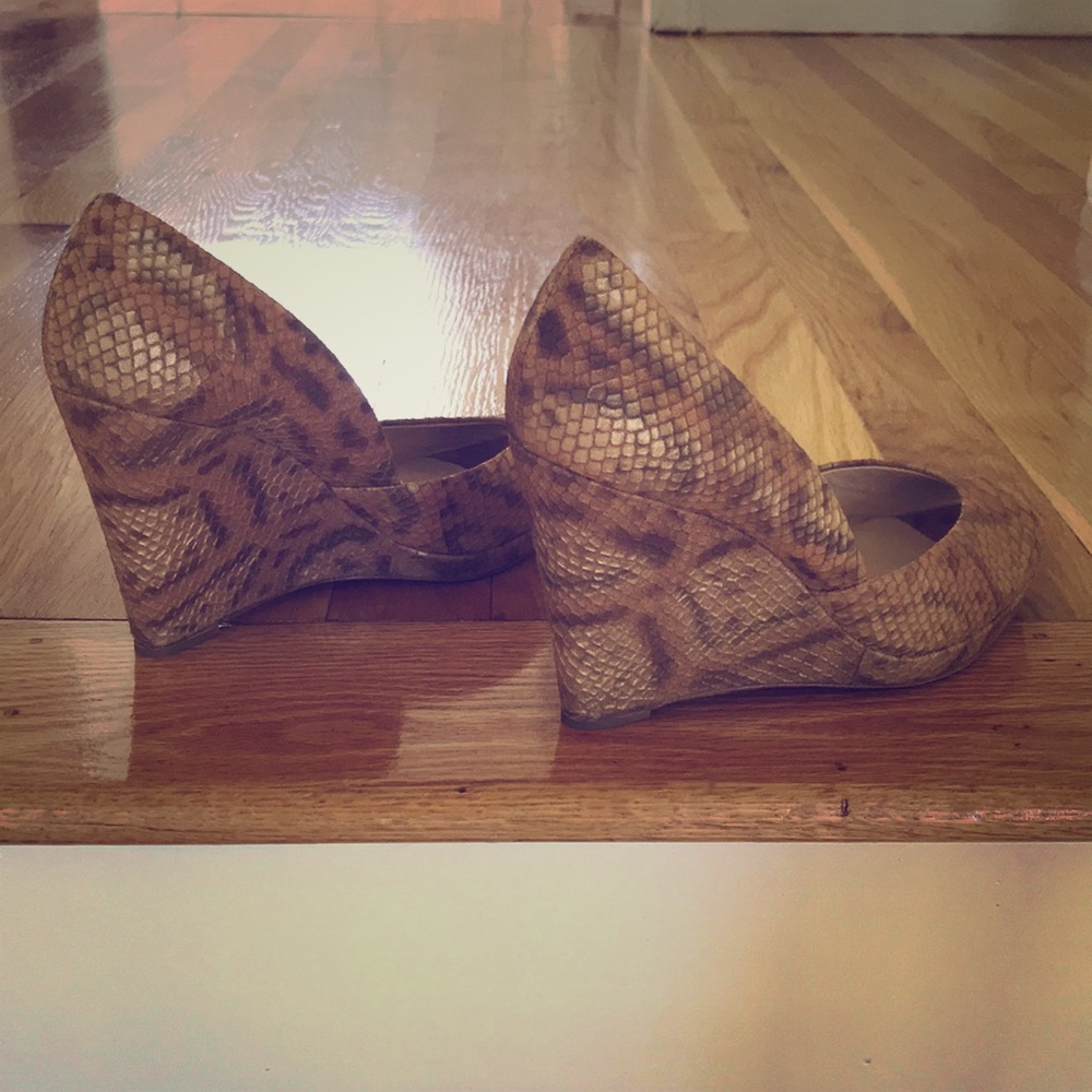 Michael Kors wedge.Size 7M